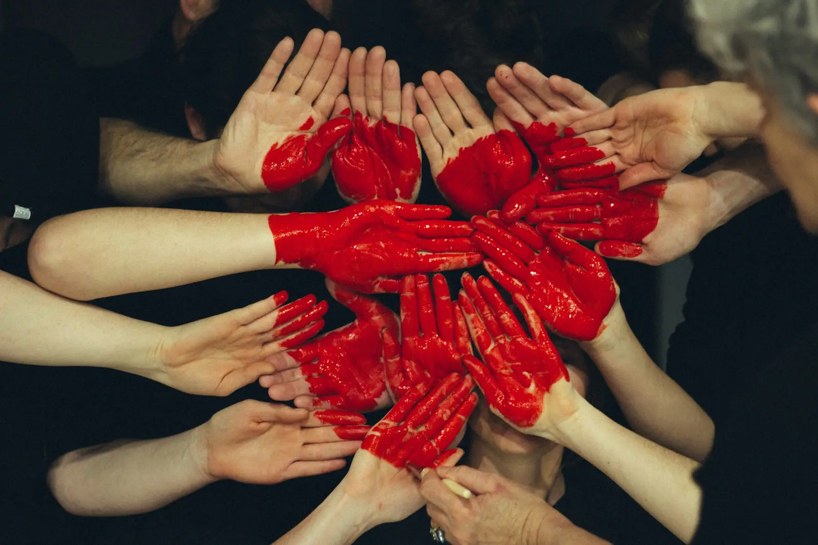 People gathered with care and hope, looking toward a shared future